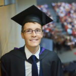 Jamie Legge in his graduation robes on his graduation day
