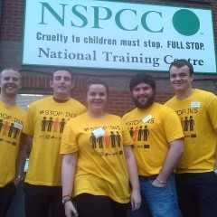 A group of staff from the NSPCC National Training Centre, wearing t-shirts with the campaign's "Stop 1 in 5" slogan.