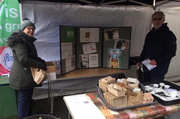 Sylvia Godfrey and David Harries standing at their stall Eco Barnoldswick , pic by EB