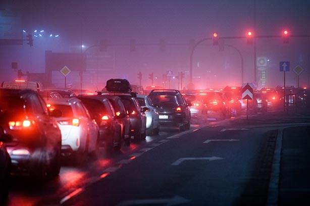 Traffic jam with car fumes pumping into the air on a late evening - pollution - pic by Jacek-Dylag on Unsplash