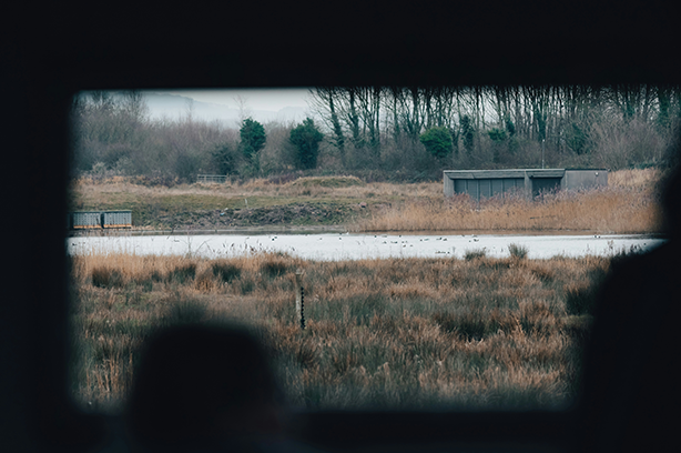 Photo by Jonny Gios on Unsplash, Brockholes Nature Reserve looking through the window of a hide
