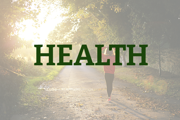 Photo by Emma Simpson on Unsplash, girl walking in the countryside, with 'health' written over the top