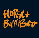 Horse Bamboo logo, orange text on a dark blue background