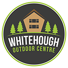 Whitehough Outdoor Centre logo, circle with a dark green background, containing an illustration of a log cabin, trees and white and green text