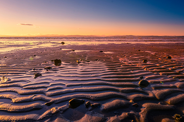 Photo by Jonny Gios on Unsplash, Morecambe beach at sunset