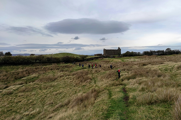 Photo by Amit Jagnade on Unsplash, walkers in the coutryside of the Forest of Bowland, Clitheroe