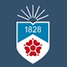 University of Central Lancashire (UCLan) logo, white and blue shield with a red lancashire rose on a blue background