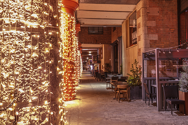 Photo by Neil Martin on Unsplash, Royal Albert Dock with the pilars light up