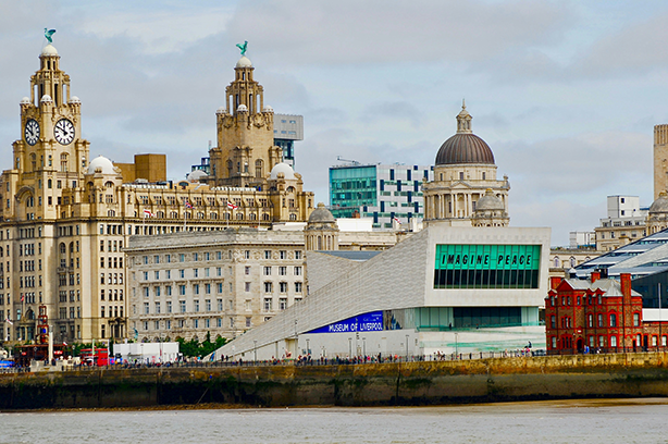 Photo by Conor Samuel on Unsplash, the Liver Building one of Liverpool's three Graces.