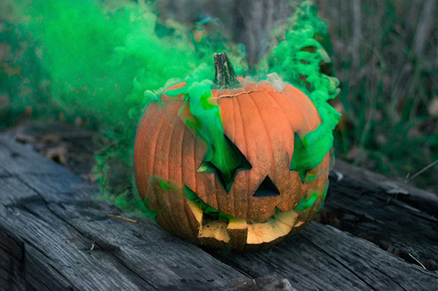 Photo by Colton Sturgeon on Unsplash, carved pumkin green smoked eyes and a halloween spirit!
