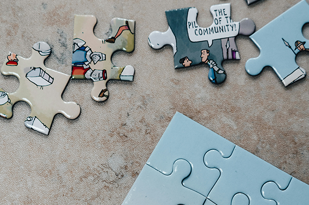 Photo by Jonny Gios on Unsplash, jigsaw pieces, some joined some loose