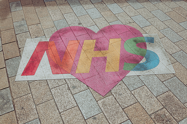 Photo by Nicolas J Leclercq on Unsplash, nhs logo with a heart