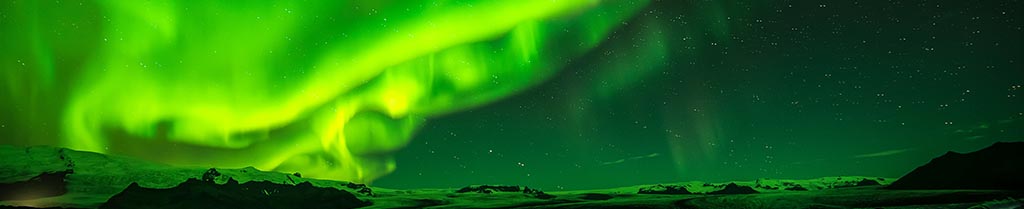 Photo by v2osk on Unsplash, the Aurora over Iceland