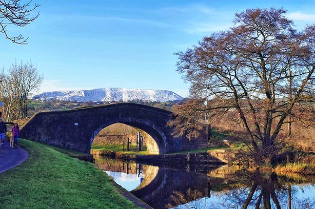 Canal in the foreground and Pendle Hill behind covered in snow pic-from-Dave-Penney-PCAG