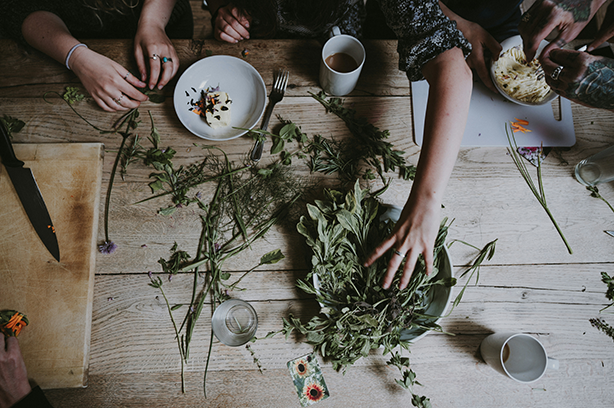 Photo by Annie Spratt on Unsplash, overhead photo of people preparing holistic medicine/food