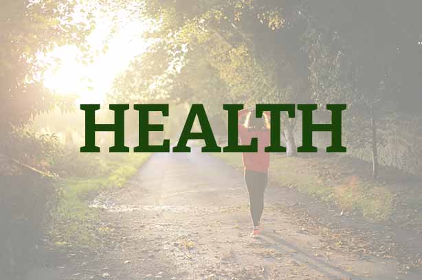 Photo by Emma Simpson on Unsplash, girl walking in the countryside, word 'health' in the foreground