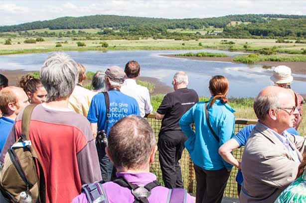 Lancashire-Environmental-Fund, group of people looking at the river from the bank