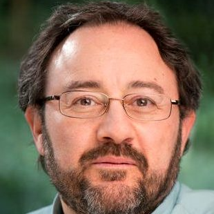 Headshot of Dr Costas Gabrielatos