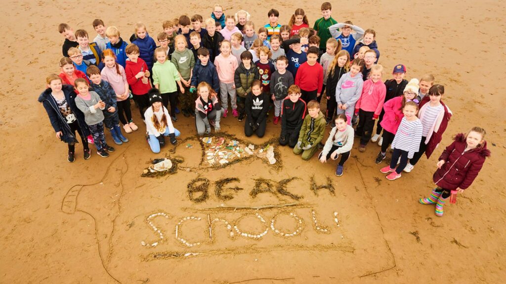 A group of students from St Jerome's Primary School involved in Beach School