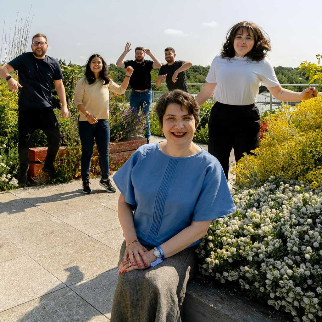 Luminita and with Dr Daniel Grimes, Gunticha Suwanmanee, Dr Ioan Matei, Oliver Maldon and Lauren Blood in the rooftop garden on Edge Hill University's campus
