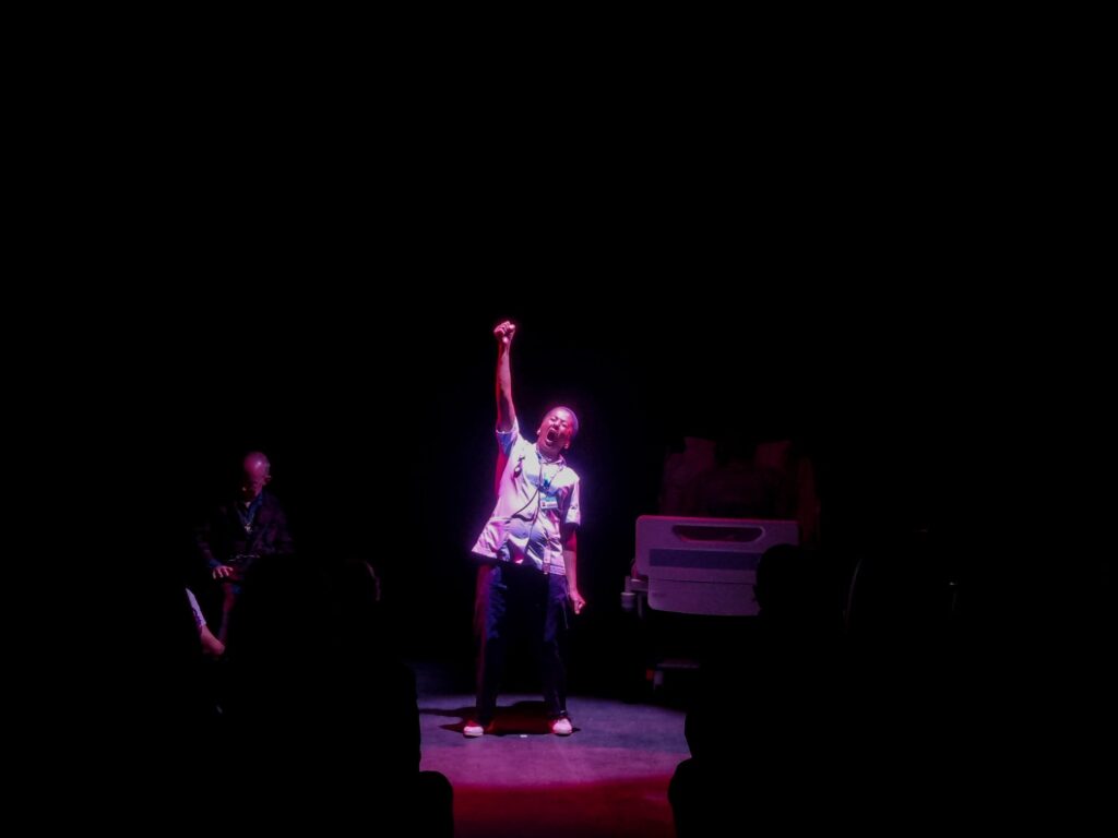 Nurse Ayesha Desai during her monologue, Lear in Brexitland (2023)