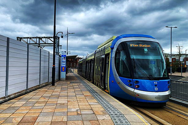 Clean Futures image of a tram stopping at a platform