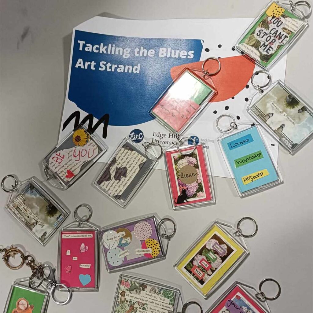 Tackling the Blues art stand featuring key chains created by students.