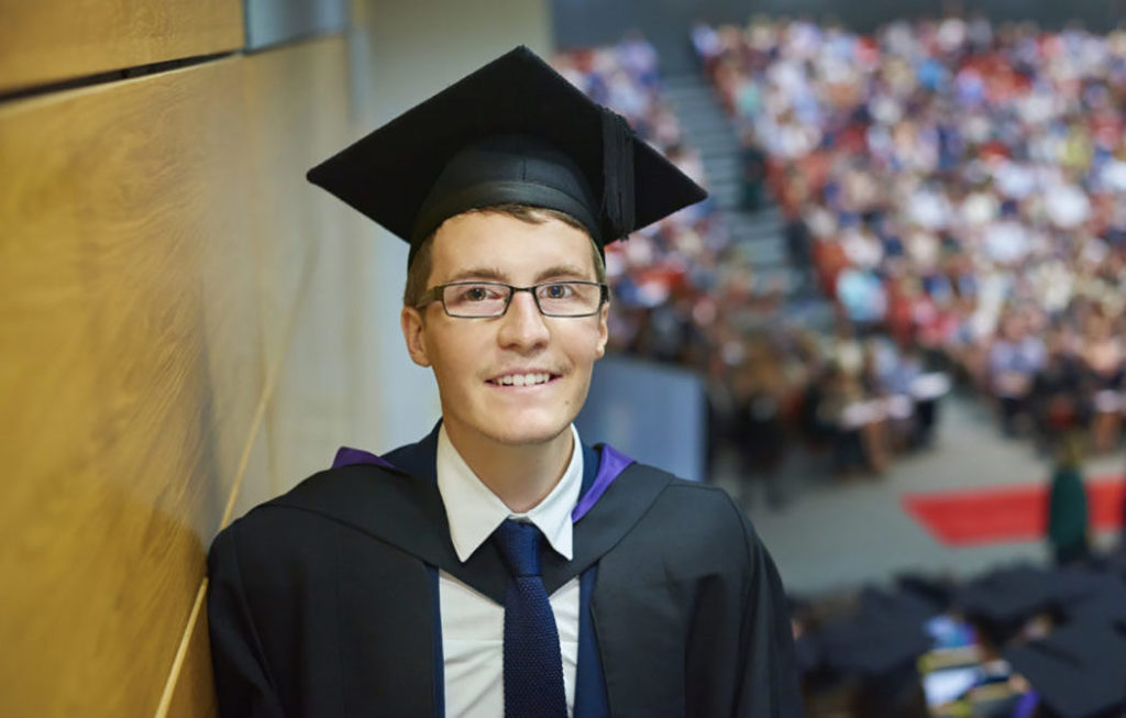 Jamie Legge in his graduation robes on his graduation day